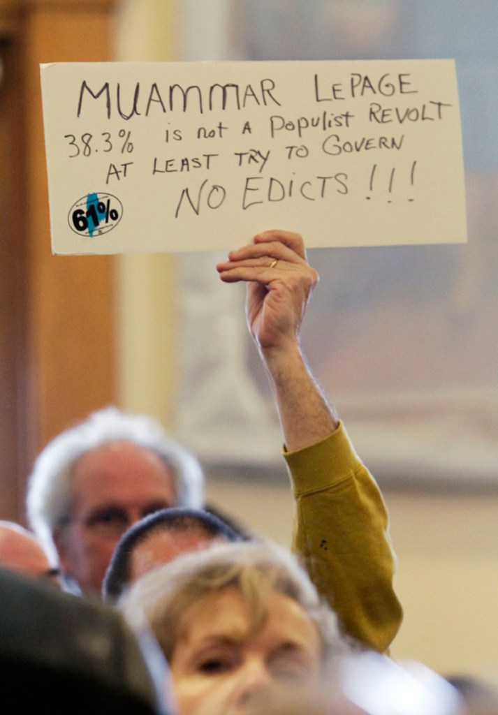 Protesters rally at the State House in Augusta, Maine demanding the return of the labor mural that Maine Gov. Paul LePage ordered removed from the Labor Department headquarters, on Monday, April 4, 2011.