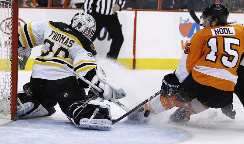 BRICK WALL: Boston Bruins goalie Tim Thomas, left, finished first in the NHL this season with a 2.00 goals against average, a .938 save percentage and a .718 winning percentage and second with nine shutouts. Now, Boston hopes to turn that regular-season success into a Stanley Cup run, starting tonight when they begin a best-of-seven series with the Montreal Canadiens.