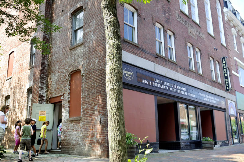 Children return to a workshop Monday at Johnson Hall in Gardiner. A fundraising effort is underway to restore the historic theater on Water Street.