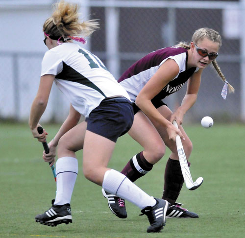 EYE ON THE BALL: Nokomis’ Jordin McGinnis, right, wins the battle for the ball against Mt. View’s Brittany Masessa, left, in the first half in the Eastern Maine Class B championship game last season at Hampden Academy. McGinnis will be playing in today’s McNally Senior All-Star Game.