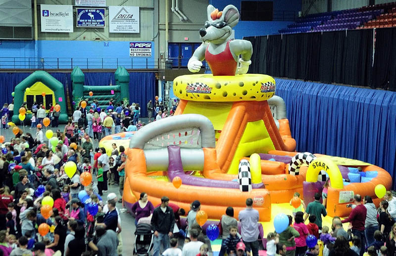 BOUNCING AROUND: There were several bounce houses at Kids Day in Capitol Park, held in Saturday at the Aguusta Civic Center.