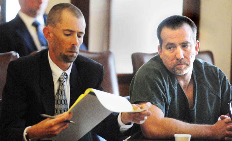 Robert MacMaster, right, confers with his attorney, Sean Farris, this morning in Kennebec County Superior Court in Augusta. MacMaster was sentenced to four years, all but 1 1/2 years suspended, after being convicted by a jury of sexual abuse of a minor.