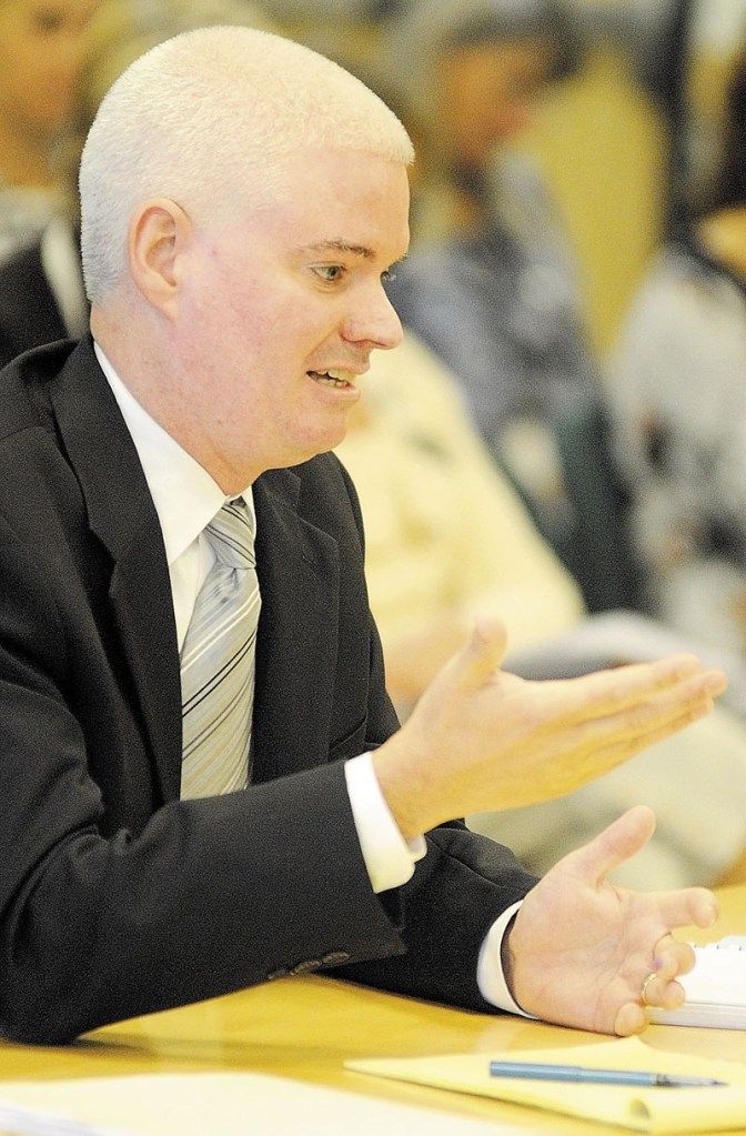 IN AUGUSTA: Chip Gavin, former Bureau of General Services Director, answers a question during a Government Oversight Committee hearing about the Thomaston land sale on Tuesday morning.