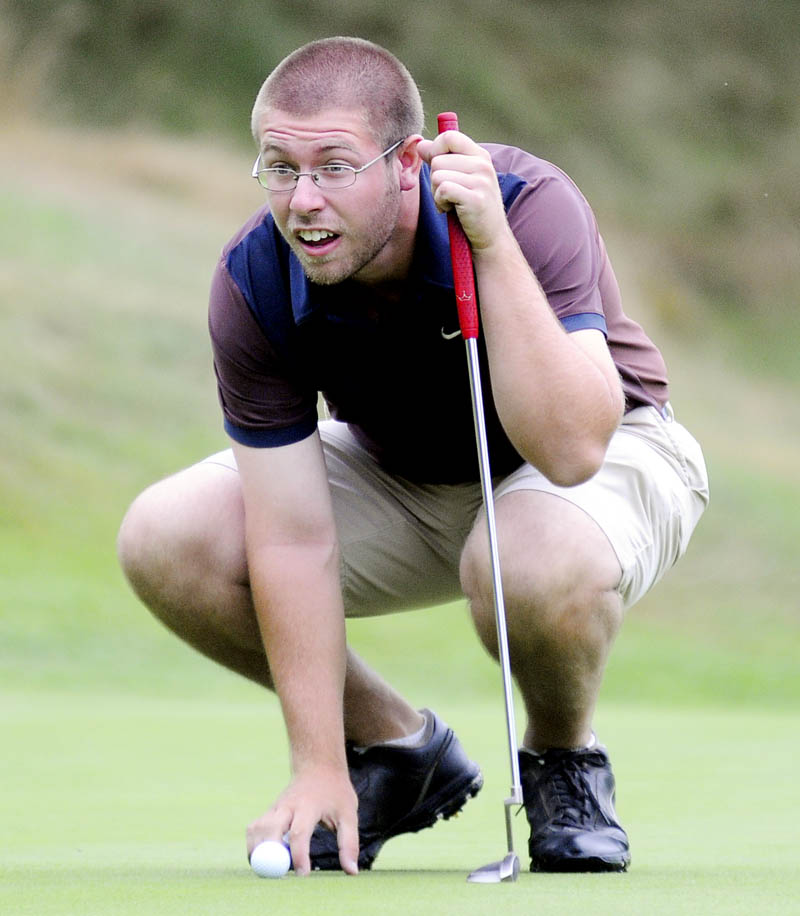 Line it up: Chris Hamel lines up putt during his second round match against Ryan Gay during the MSGA Match Play Invitational on Wednesday at the Augusta Country Club in Manchester.
