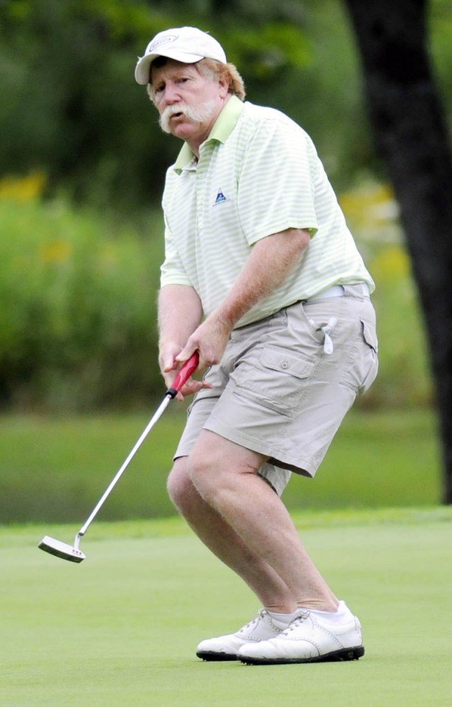 PAUSE: Mark Plummer putts during the MSGA Match Play Invitational Wednesday at the Augusta Country Club in Manchester.