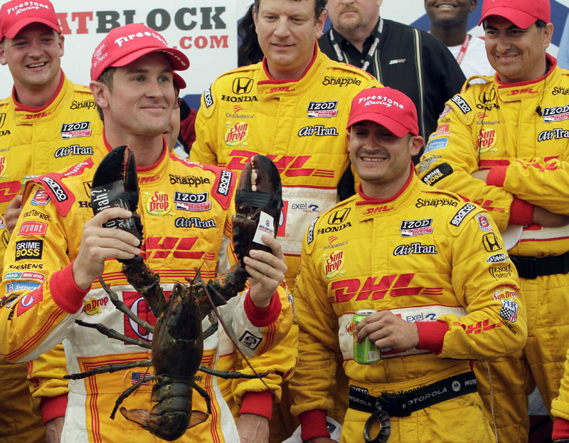 QUITE A CATCH: With his crew behing him IndyCar driver Ryan Hunter-Reay holds a lobster given to him after winning the MoveThatBlock.com 225 Sunday at New Hampshire Motor Speedway in Loudon, N.H.