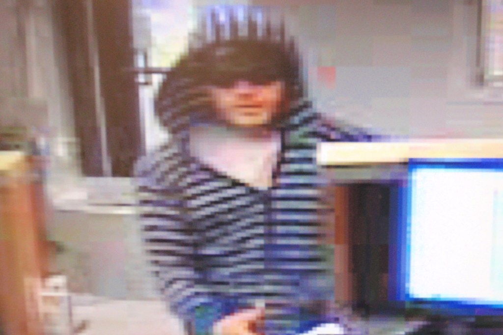 The man suspected of robbing the Winslow Community Federal Credit Union Thursday morning is seen on a security video image.