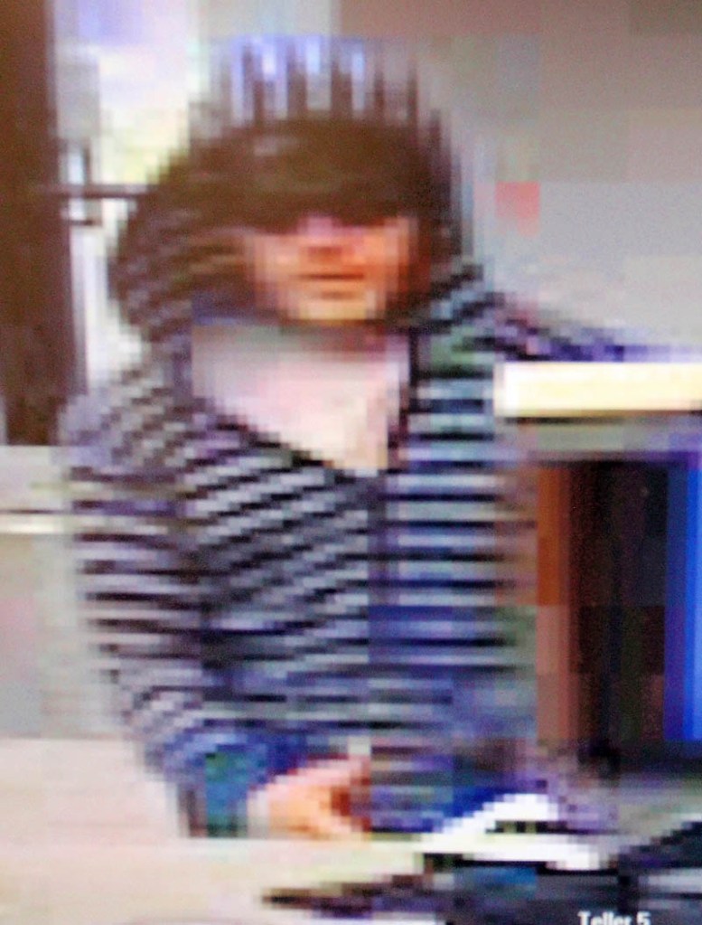 The man who robbed the Winslow Community Federal Credit Union on Thursday is shown on security camera video.