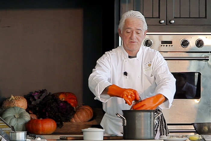Thomas Reagan, a personal chef from Kennebunk, prepares Slow Poached Maine Lobster Tail Nipponese during the Lobster Chef of the Year competition at Ocean Gateway in Portland today.