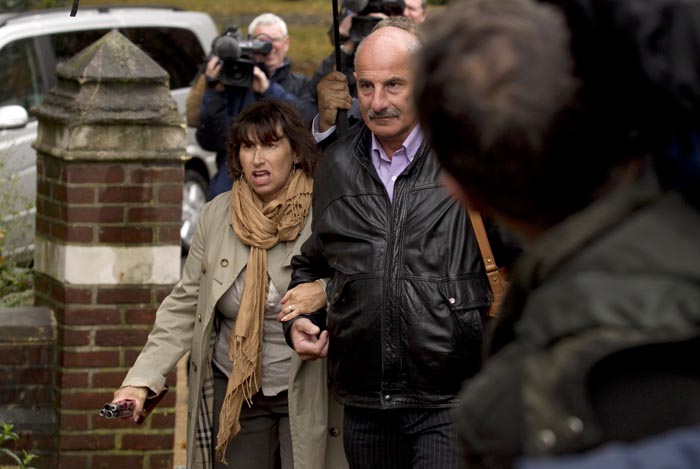 Amy Winehouse's mother Janis, left, arrives today at St. Pancras Coroner's Court in London for a hearing into the singer's death.