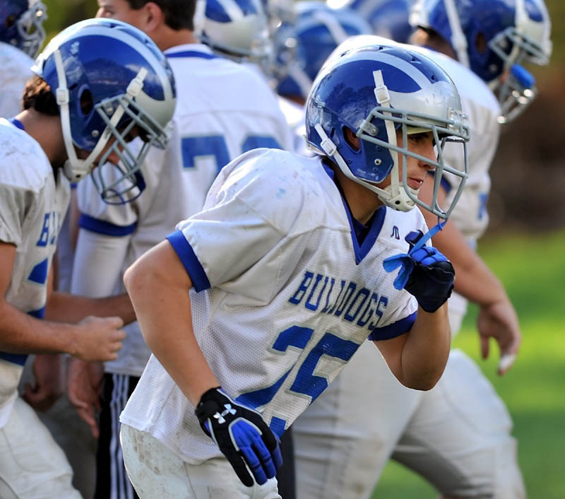 MAKING HIS PRESENCE: Lawrence High School's Jake Doolin (25) works out Wednesday afternoon at Lawrence in Fairfield.˗