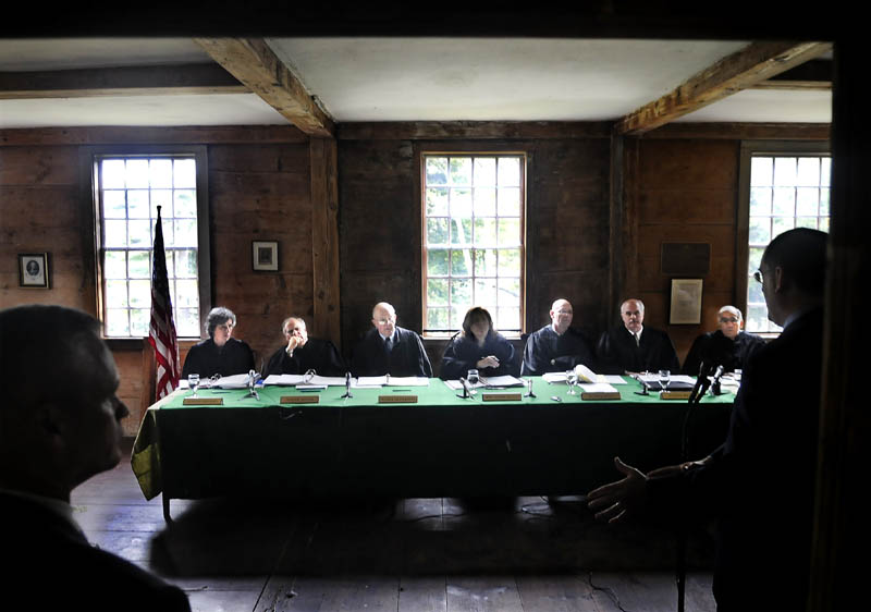 Attorney Sigmund Schutz, right, argues a case Wednesday before the Maine Supreme Court at the Pownalborough Court House in Dresden. The Court convened at the historic building to celebrate its 250th anniversary and heard civil cases. The first legal case was heard at the Pownalborough Court House on Sept. 12, 1761. At left is Maine Judicial Marshal William Snedeker.