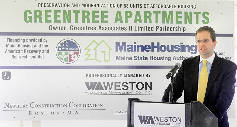 A NEW LOOK: Michael Packard, vice president of operations of Weston Associates, speaks during a news conference Wednesday held to show off the newly renovated Greentree Apartments on New England Road in Augusta.