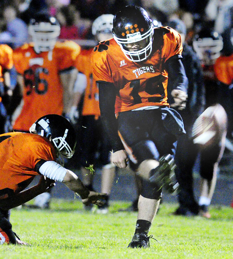 Gardiner's Dennis Meehan kicks an extra point during a game against Oceanside earlier in the season at Hoch Field in Gardiner.