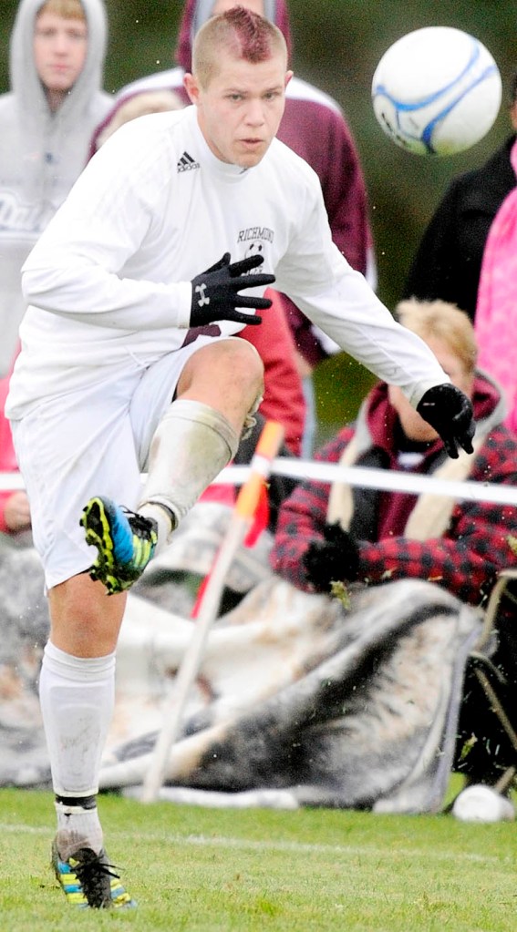 BIG GAME: Richmond’s Randy Moody takes a shot against Vinalhaven in a Western Class D semifinal game Saturday in Richmond. Moody scored twice.