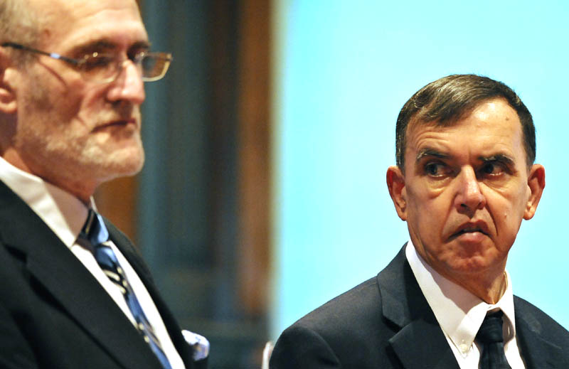 NOT GUILTY PLEA: Former Republican state representative Frederick Wintle, right, listens to his attorney, Leonard Sharon, Tuesday at Kennebec County Superior Court in Augusta, where he entered not guilty pleas to an indictment accusing him of pointing a gun at a man last May in a Waterville parking lot.