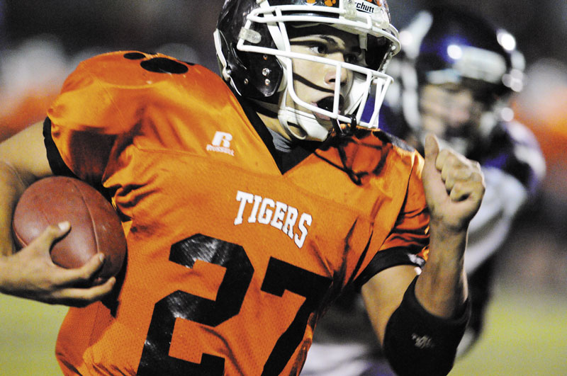 MIXING THINGS UP: Alonzo Connor still carried a heavy load for the Gardiner football team this fall, rushing for over 1,400 yards and scoring 27 touchdowns this season, but the Tigers managed to diversify their offense. Quarterback Dennis Meehan passed for 1,055 yards and 11 touchdowns for the Tigers, who finished 7-3.