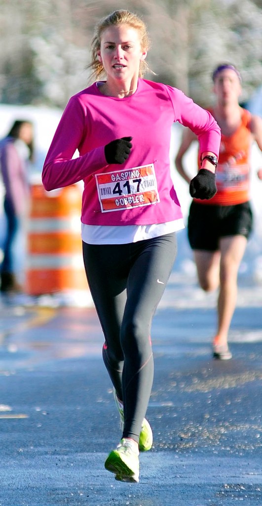 Betsy Burke was the first female finisher in the Gasping Gobbler 5K Road Race to Benefit Cony High School Athletics Thursday in Augusta.