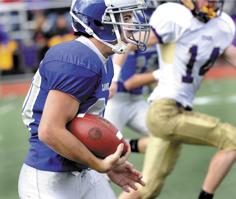 Lawrence High School's Anthony Sementelli runs for the Bulldogs only touchdown in the Class A state championship game against Cheverus on Saturday at Fitzpatrick Stadium in Portland.