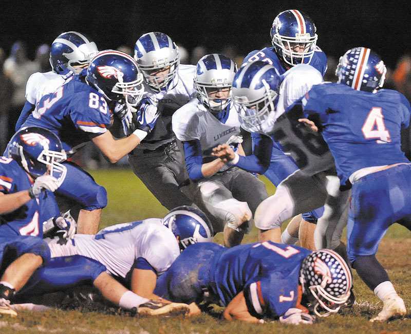 STRONG UP FRONT: Lawrence High School’s defensive line was inexperienced at the start of the season but has become one of the best in the state. The Bulldogs have allowed just under 12 points per game.
