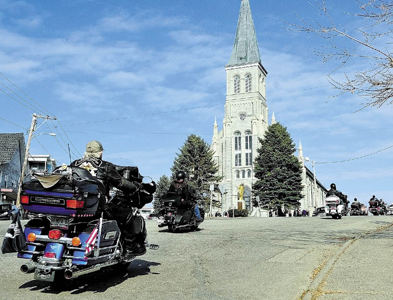MOTORCYCLE MEMORIAL: About 40 motorcyclists arrive for the Memorial Mass of Christian burial for Simone M. Duplessis on Wednesday morning at St. Augustine Church in Augusta. The group — with members of the Combat Veterans Motorcycle Association and the Harley Owners Group Mid-Maine Chapter — met up and rode in from Lewiston in honor of their late friend.