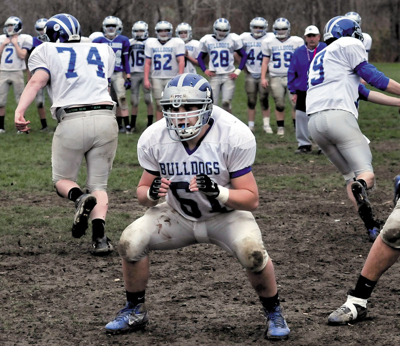 Josh Perry has been a starter on the Lawrence football team since 2009. He is following in the footsteps of his father John, who was a captain for the Bulldogs in 1980.