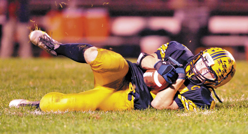 GOING ALL OUT: Izaiha Tracy and the Mt. Blue High School football team face two-time defending conference championship Leavitt tonight in the Pine Tree Conference B title game.