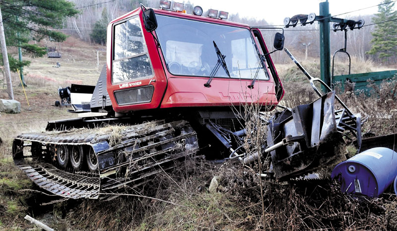 This snow-grooming machine came to a halt in a ditch after apparently running over Eaton Mountain Ski Area owner David Beers while he worked on it Sunday at the Skowhegan facility. Beers had surgery for a dislocated ankle and suffered a broken jaw. His wife, Donna, reported that he is doing better on Monday.