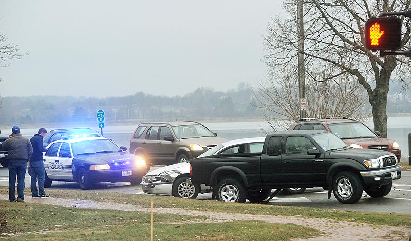 Freezing rain created black ice conditions for pedestrians and drivers alike during this morning's commute. This fender bender occurred on Portland's Baxter Boulevard.