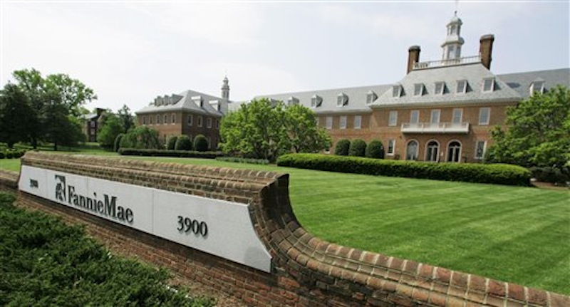 FILE - In this May 2, 2007 file photo shows Fannie Mae's building in Washington. The Securities and Exchange Commission has charged six former top executives at Fannie Mae and Freddie Mac with civil fraud, saying they misled the government and taxpayers about risky subprime mortgages the mortgage giants held during the housing bust. (AP Photo/Manuel Balce Ceneta, file)