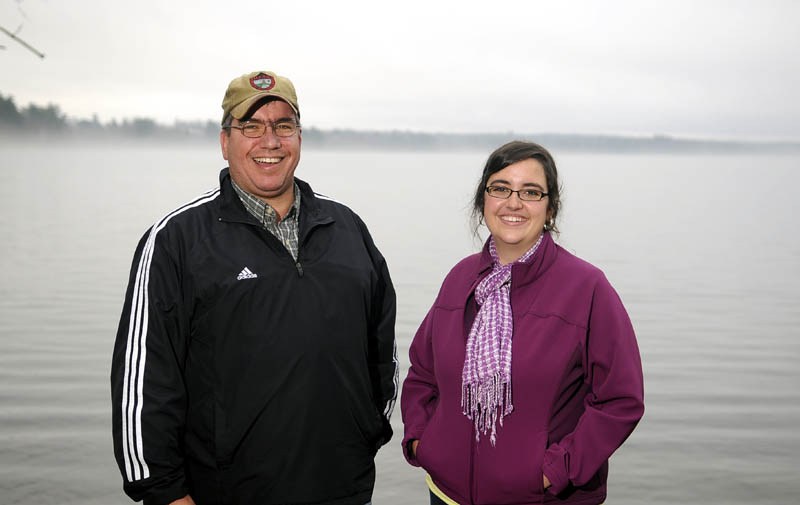 Megan Ferland, right, is home on Cochnewagon Lake in Monmouth with her father, Paul, and mother, Sherry, after being treated for a rare, life threatening form of encephalitis in Boston. The community rallied behind the Ferlands with emotional and financial support during the ordeal.