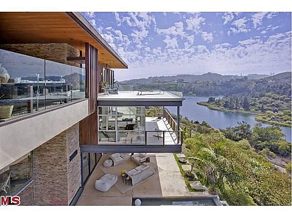 The mansion features cantilevered decks and an open "sky terrace."