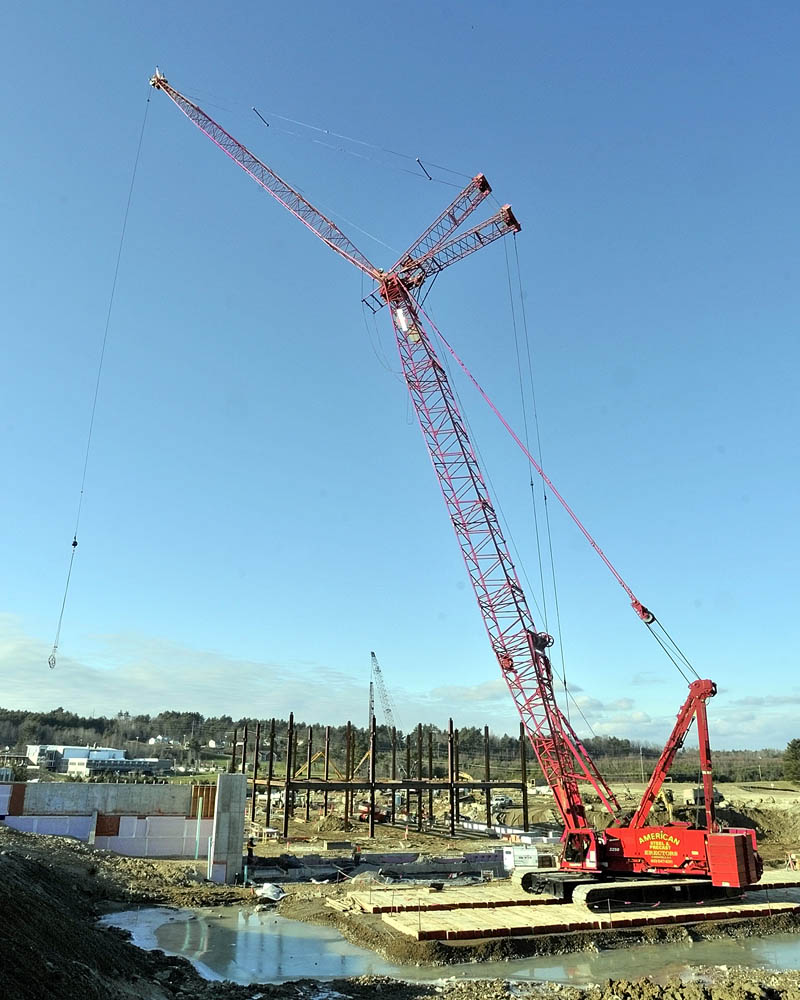 LOOKING UP: The newest crane on the site of the new regional hospital being built by MaineGeneral Medical Center is 310 feet tall — 5 feet taller than the torch of the Statue of Liberty — and will be used to place 4,000 tons of steel to form the structure of the 192-bed hospital in north Augusta.