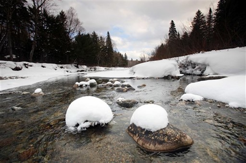 In this Jan 28, 2011 file photo, Wassataquoik Stream flows through Township 3, Range 8, Maine, on land owned by Roxanne Quimby, the founder of Burt's Bees cosmetics company. Quimby has offered to donate a 70,000-acre parcel she owns to create a national park adjacent to the state's Baxter Park. But former state Senate president Charles Pray wants a study that looks beyond the scope of a national park's possible impacts on tourism and looks at its broader implications. (AP Photo/Robert F. Bukaty, File)