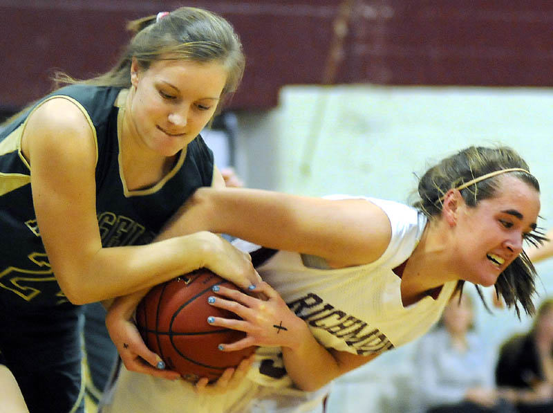 THE FLIP: Richmond High School's Jamie Plummer, right, pulls the ball away Tuesday from Rangeley Lakes Regional High School's Jenney Abbott during a basketball match up in Richmond.