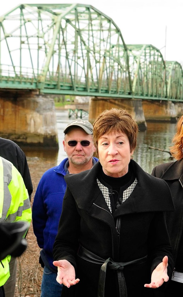 A CLOSER LOOK: Sen. Susan Collins stands in front of the Maine Kennebec Bridge, known to locals as the Richmond-Dresden Bridge, on Friday in Dresden. Collins is hopeful the bridge will receive $10.8 million in federal funding to help start construction of its replacement next year.