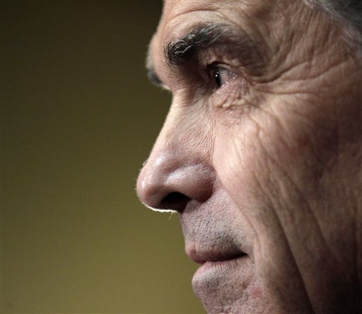 Republican presidential candidate Texas Gov. Rick Perry listens to a question during a campaign stop in Fort Dodge, Iowa, Saturday, Dec. 31, 2011. (AP Photo/Charlie Riedel)