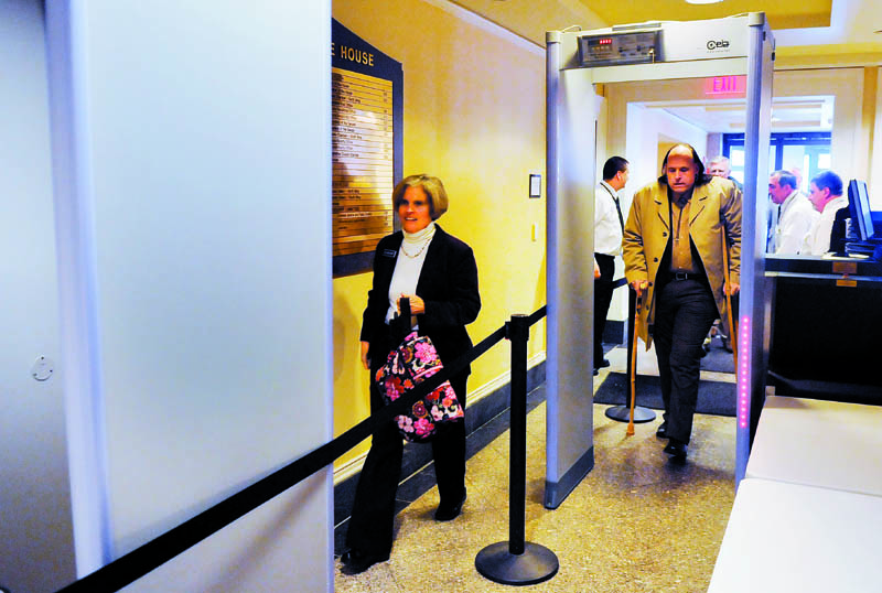 Metal detectors are being used along with screeners at the entrance of the State House in Augusta.