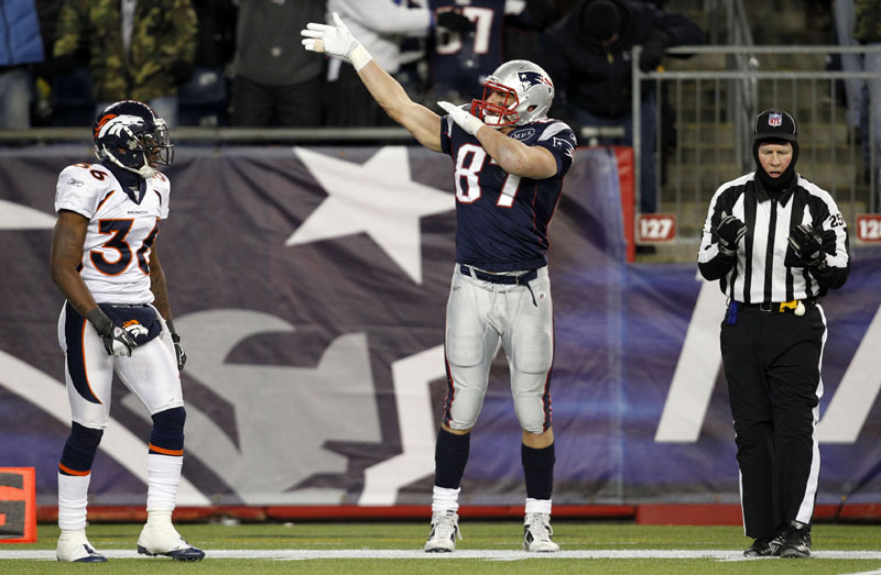 AP photo THAT’S A NEW ENGLAND PATRIOTS’ FIRST DOWN: New England Patriots tight end Rob Gronkowski (87) scored three touchdowns in the first half of the Patriots’ 45-10 win over the Denver Broncos in an AFC divisional round game Saturday night in Foxborough, Mass. The Patriots will play the Baltimore Ravens in the AFC Championship Game on Sunday. playoff playoffs