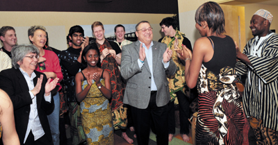 Gov. Paul LePage dances to African drumming this morning during a Martin Luther King Day breakfast at the Muskie Center in Waterville.