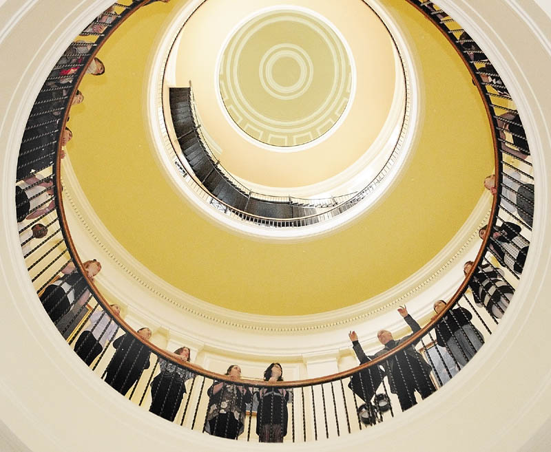 Kevin Rhein directs the Messalonskee High School Chamber Singers on Wednesday morning at the State House in Augusta. The 30 singers from the high school in Oakland sang the National Anthem on the first day of the House of Representatives second legislative session.