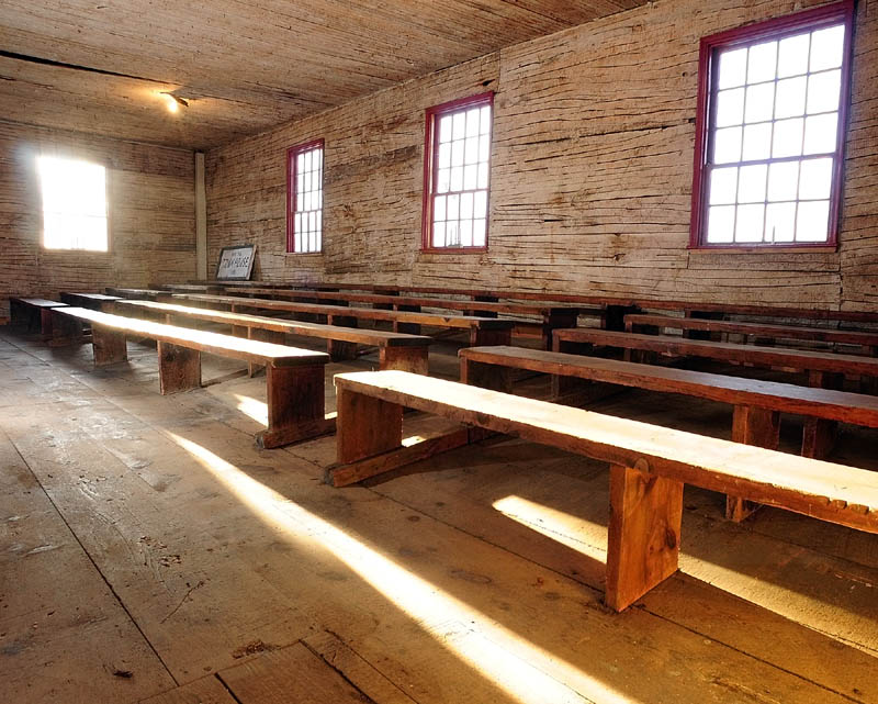 Tiered rows of benches line both sides of the the Wayne Town House. The historic building is located on Route 133 across the road from the state boat launch. The lathes are visible because the horse hair plaster was removed during the recent renovations.