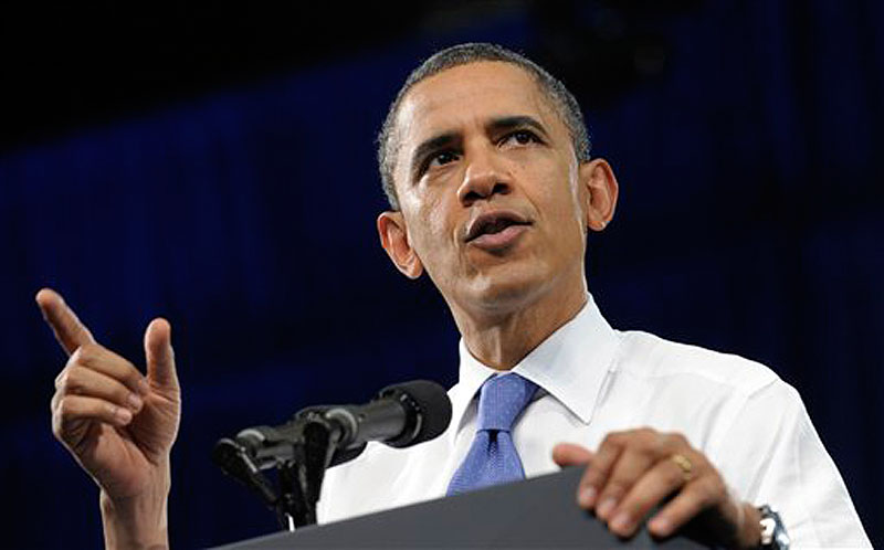 President Barack Obama speaks at the University of Miami Field House in Coral Gables, Fla., Thursday, Feb. 23, 2012. (AP Photo/Susan Walsh)