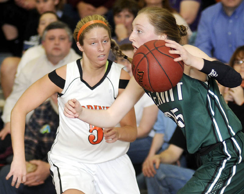 PRESSURE ON: Gardiner Area High School’s Paige Pilsbury, left, keeps the pressure on Leavitt Area High School’s Kristen Anderson during a basketball game Thursday in Gardiner.