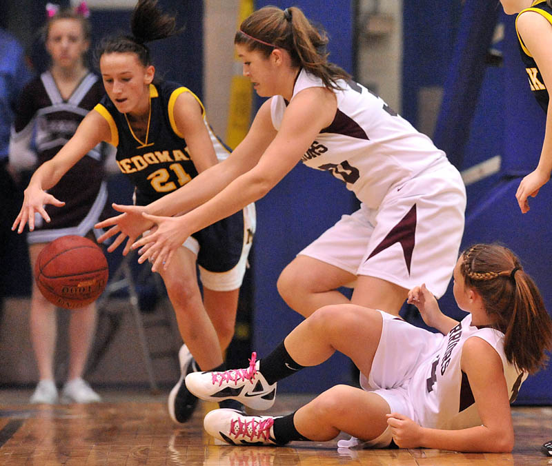 Photo by Michael G. Seamans in the second half of the Eastern Class B quarterfinals game at the Bangor Auditorium Saturday. Nokomis defeated Medomak Valley 58-51.