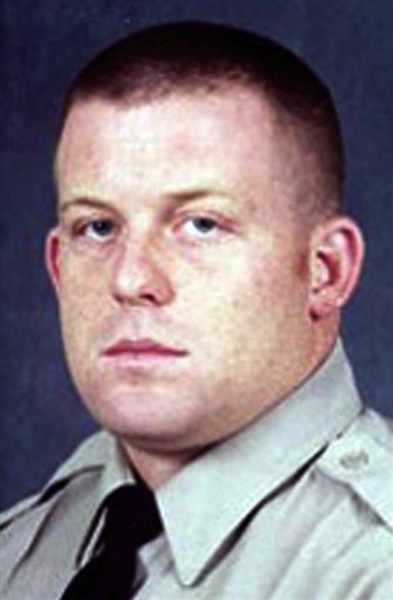 This photo provided by the Scottsdale, Ariz., Police Dept. shows Scottsdale Police Officer James Peters. (AP Photo/Scottsdale Police Department) - HANDOUT PHOTO -