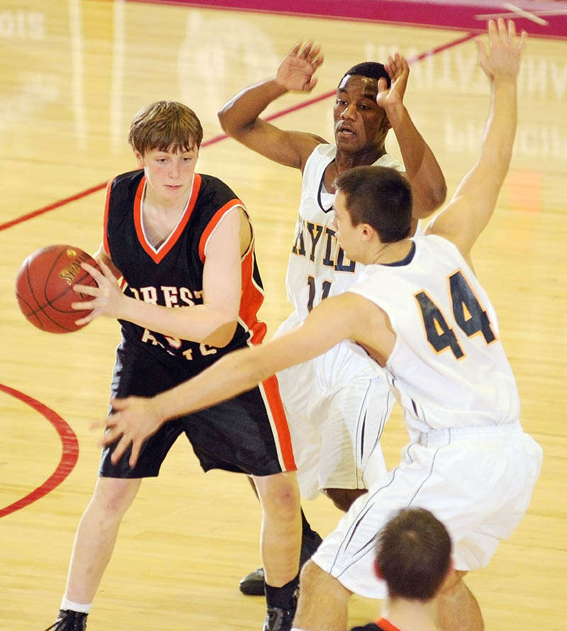 SEEKING OPTIONS: Forest Hills freshman Ryan Petrin, left, is double-teamed by Hyde defenders Tyqyan Ekejiuba, center, and Talin Rowe during the Western D championship game Saturday afternoon at the Augusta Civic Center. Forest Hills rallied to win 61-60.