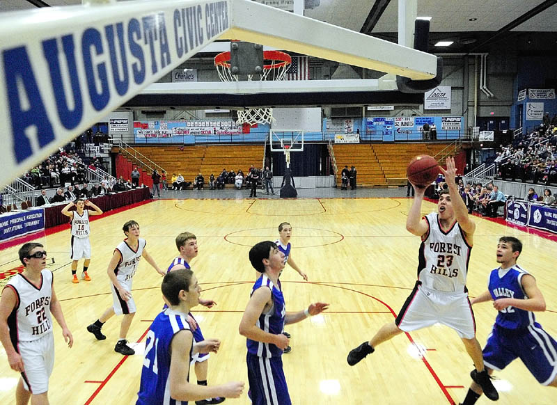 Forest Hills forward Evan Worster takes a shot during the Class D West tournament on Wednesday morning at the Augusta Civic Center.