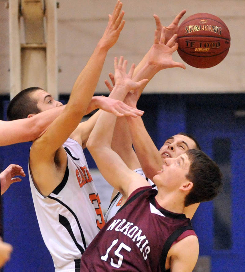 Photo by Michael G. Seamans in the first half of the Eastern Class B quarterfinals game at the Bangor Auditorium Friday. Gardiner won 56-47 in over time.