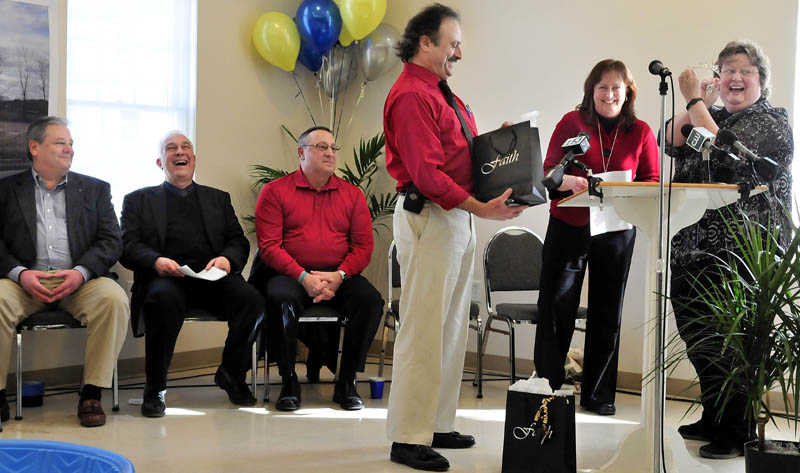 MANY THANKS: Mid-Maine Homeless Shelter Chairman of the Board of Directors Kevin Joseph and Executive Director Betty Palmer, right, present Susan Reisert with a tiara during a light moment in a ground breaking ceremony held at the Pleasant Street United Methodist Church for the new shelter on Monday. Other speakers included from left Rick Mackenzie, Doug Cutchin and Gov. Paul LePage.